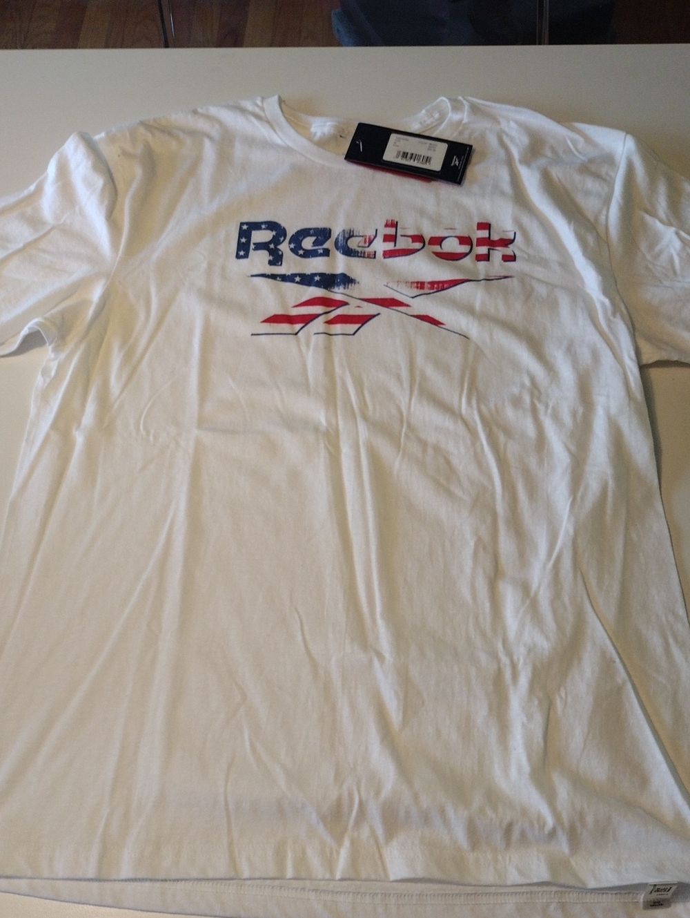 Reebok Men’s White Tee with Red & Blue Flag Logo (NWT) BOGO